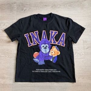 Inaka Power Black Tee with Purple and Orange Design